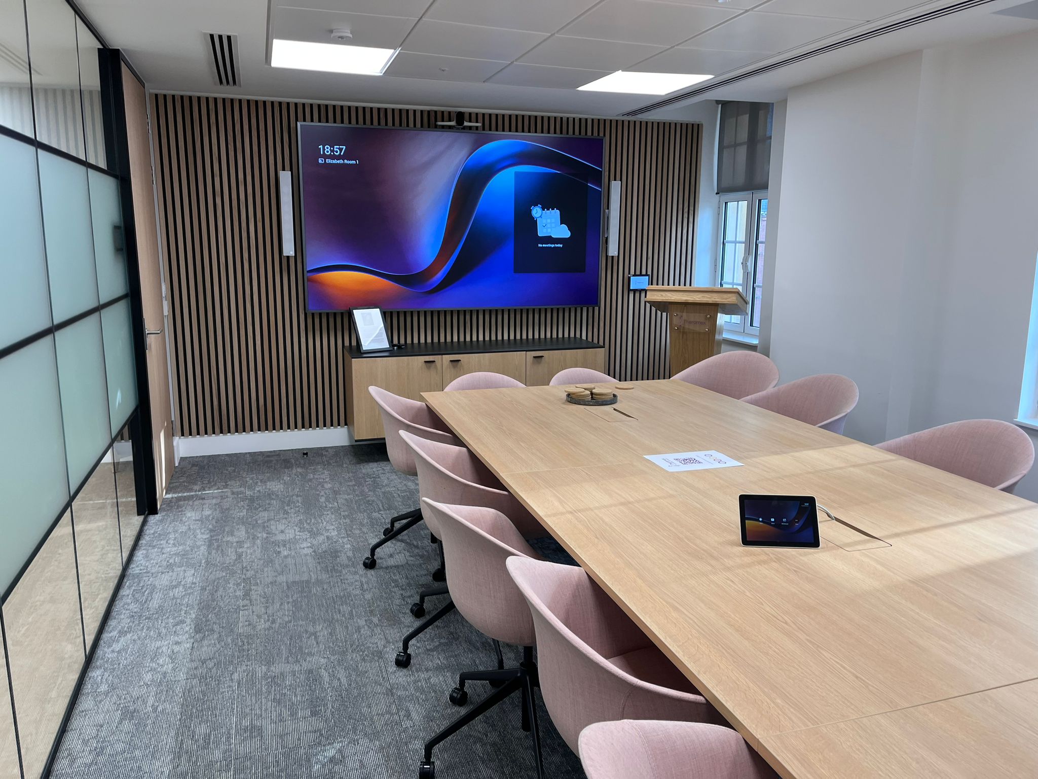 Corporate office, large boardroom with partition - hybrid working. Installed by AV Experts Runtech in London