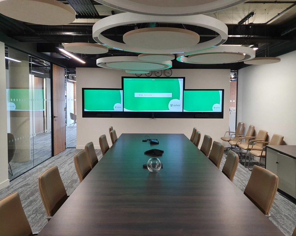Runtech – Upfield boardroom Upfield London - Large boadroom audio visual solutions with three displays video conferencing AV installation - Runtech